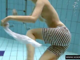 Vera Brass wet and sexually aroused in the swimming pool